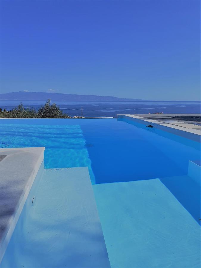 Villa Infinity ∞ ซานตาเทเรซา ดี รีวา ภายนอก รูปภาพ